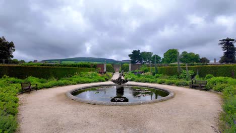 powerscourt gardens in wicklow,the walled gardens,ornate fountain and manicured hedges ireland epic locations