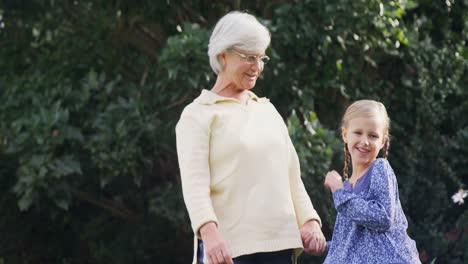 grandmother pointing something out to little girl and laughing 4k 4k