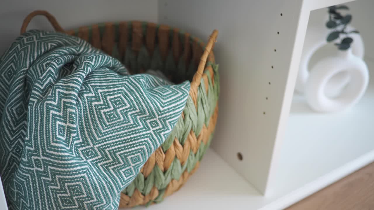 Basket with Blanket on Shelf