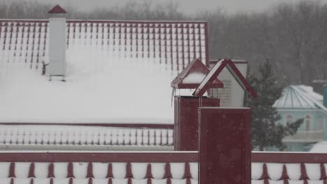 view of tiled roofs and chimneys