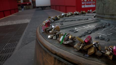 lovers´ padlocks attached to streetlights in plaza mayor