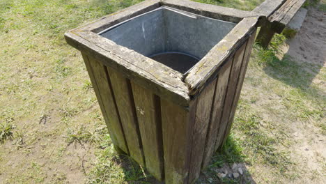 old unattended dirty bin, bad park maintenance and municipal field service