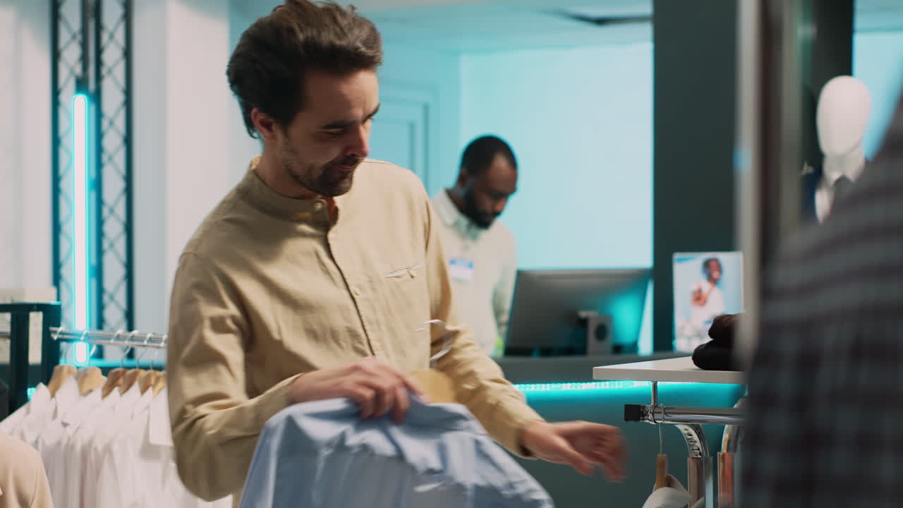 Man shopping for clothes at a clothing store