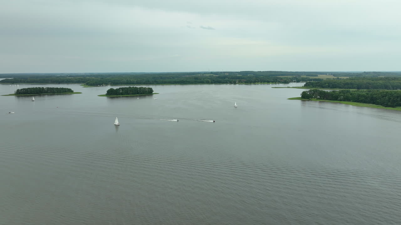 Aerial View of Sailboats on a Calm Lake