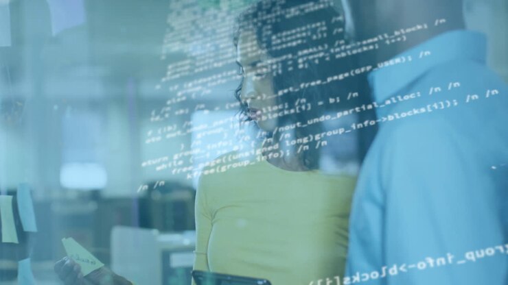 In office, business professionals collaborating with animation overlay on screens