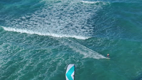 kiteboarding in turquoise waters