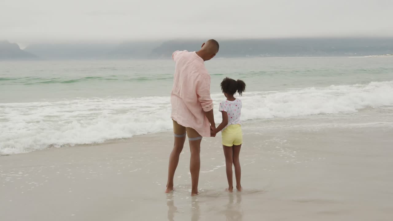 Family enjoying free time by the sea