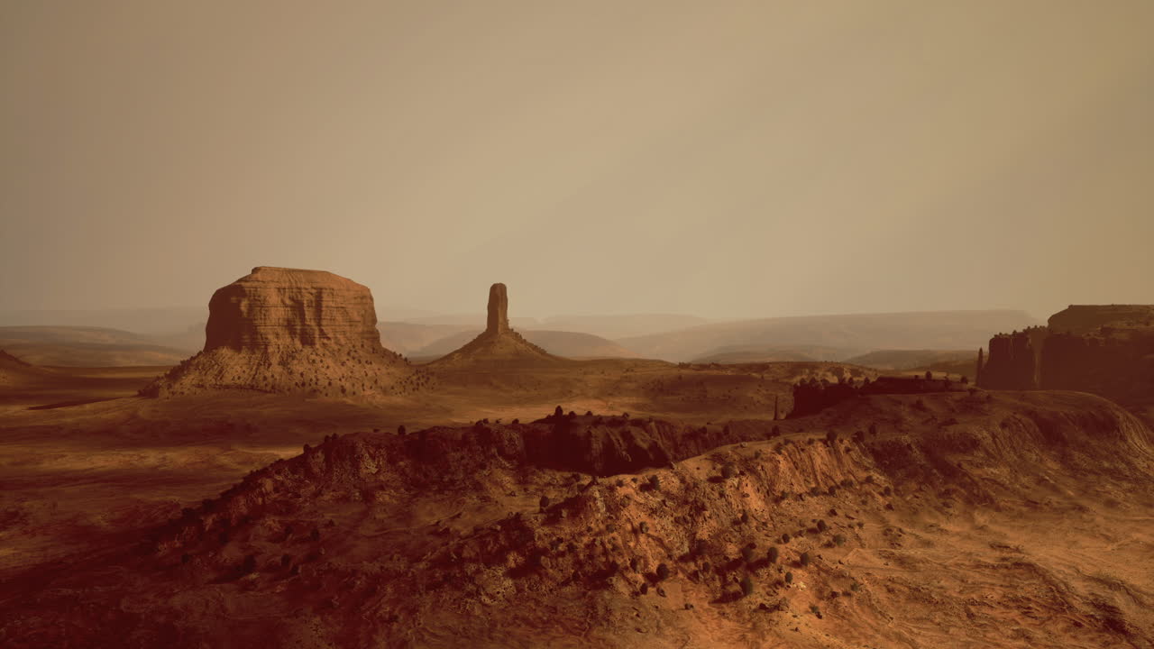 Vast desert landscape with unique rock formations in a serene setting