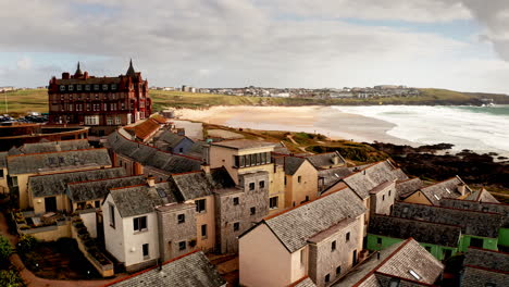 aerial drone shot over the headland hotel located on cornwall's idyllic coastline