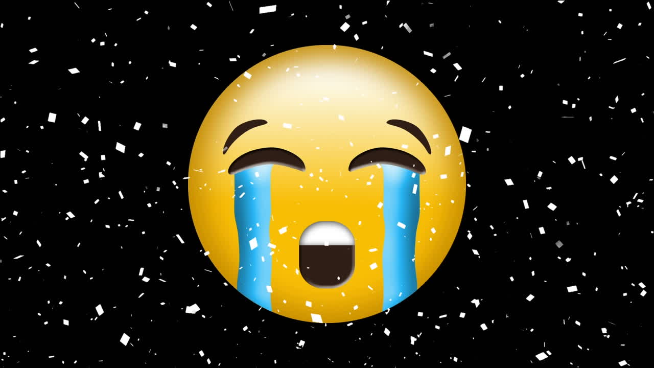 검은색 배경에 울고 있는 얼굴 이모지 위에 떨어지는 콘페티의 디지털 애니메이션