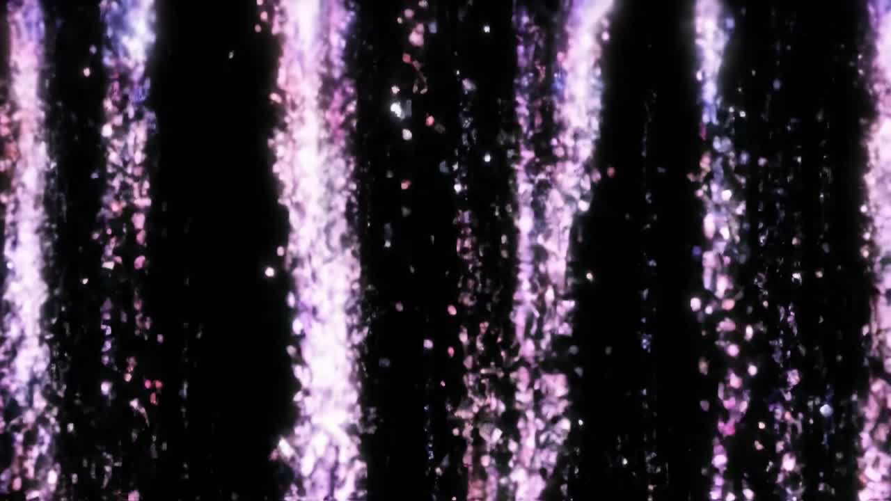Colorful confetti particles burst and fall in a mesmerizing display. The vibrant colors create an enchanting atmosphere, perfect for celebrations and special events. Enjoy the captivating movement.