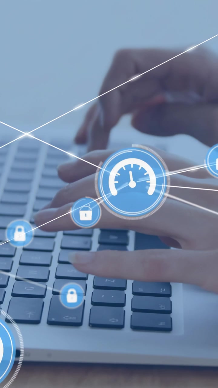 Vertical video: Woman typing, hands resting starting HUD, padlocks, files forming IT grid over keys