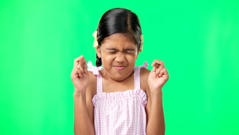 Child,-wish-and-fingers-crossed-on-green-screen