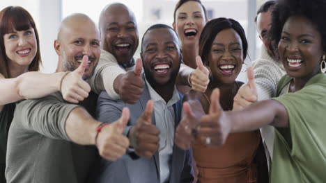 a group of businesspeople showing thumbs up