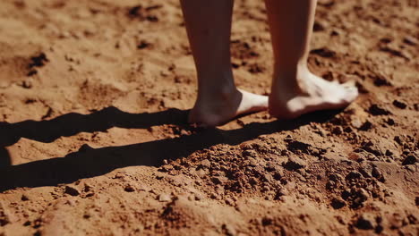 barefoot steps on dry earth