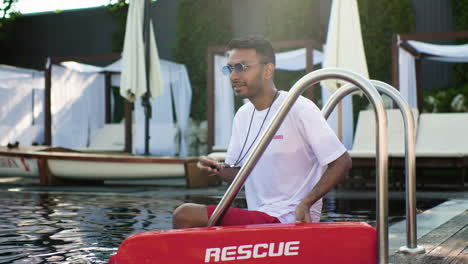 lifeguard by the pool