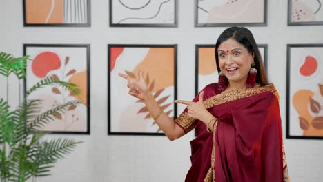 Indian-woman-pointing-at-Copy-space