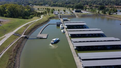 drone shot of a boat docking at the clarksville marina dock in tennessee