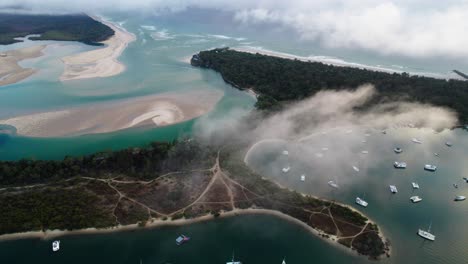 Luxury-Catamaran-Boats-In-Noosa-River-Mouth-During-Sunrise-In-Sunshine-Coast,-QLD-Australia