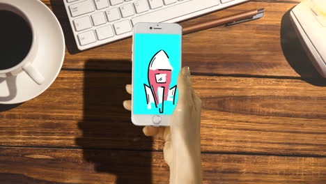 hand touching digitally generated icon on mobile phone