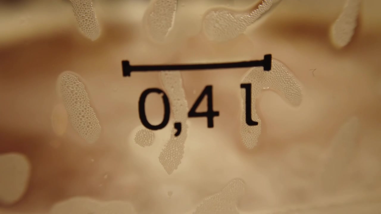 Beer in a glass. Shooting of macro.