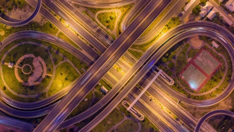 time lapse,hyper lapse ,of traffic on city streets at night. aerial view and top view of traffic on freeway, 4k.