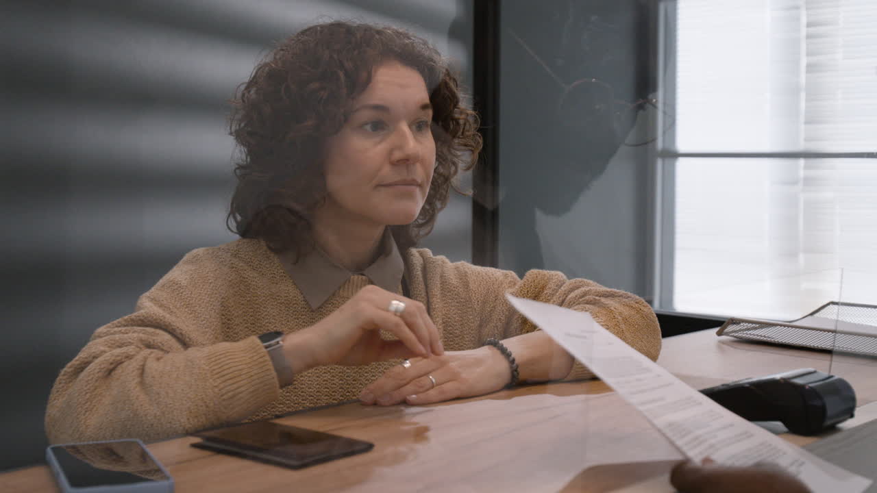 Business meeting with protective barrier