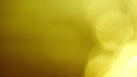 movimiento de brillo de color dorado círculo de iluminación en fondo marrón