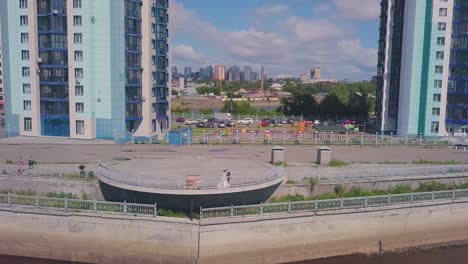 newly-wedded-couple-on-waterfront-on-nice-day-bird-eye-view