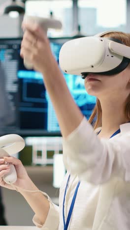 vertical video female technician wearing vr goggles coding with ai language model assistance