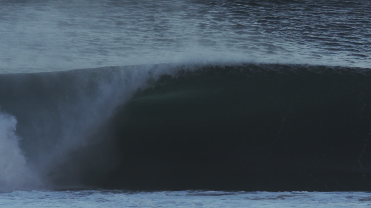 Wave folds with intense contrast lighting, heavy surface and misty highlight edge