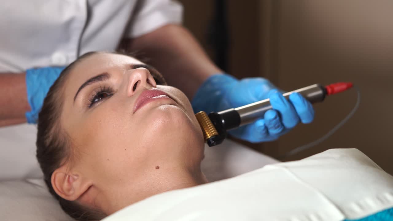 Woman Receiving Facial Treatment