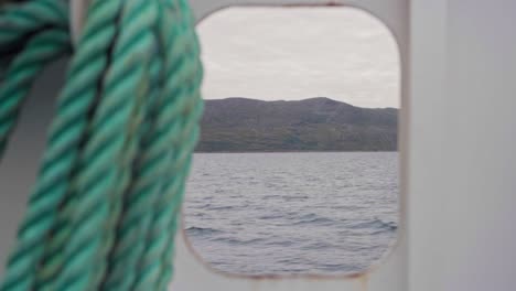 winding nautical knot rope of a sailing ship at calm sea during daytime in norway