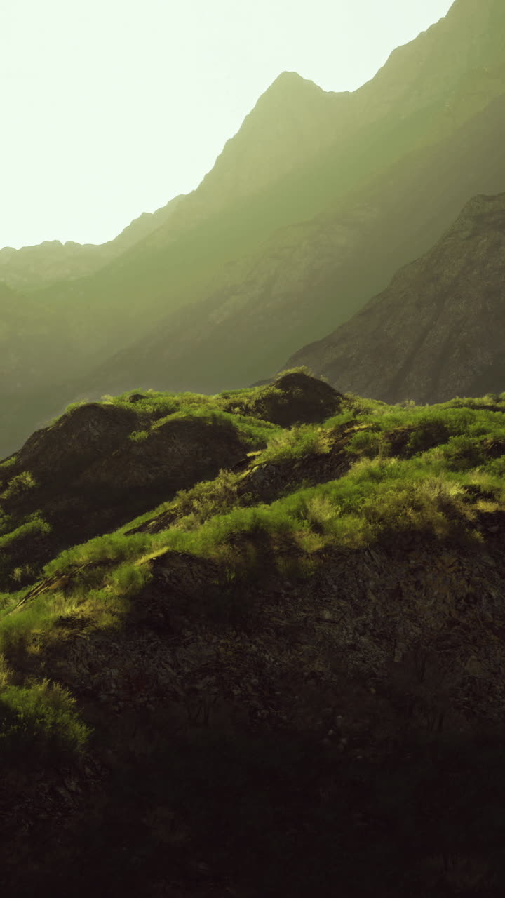 Scenic mountain landscape with lush green hills during sunset