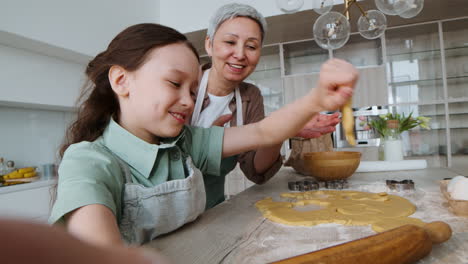 grandma and girl baking