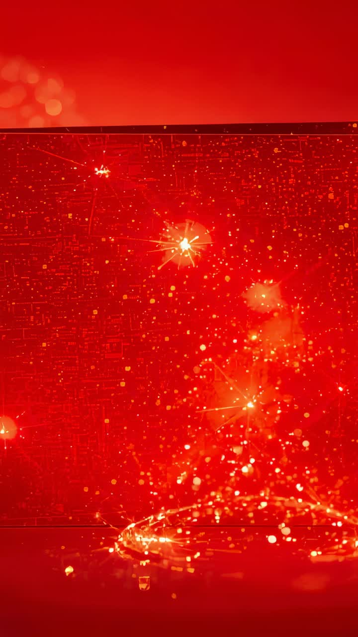 Vertical video: Glowing red LED panel pulsing on activation in studio, casting sparkles on tabletop