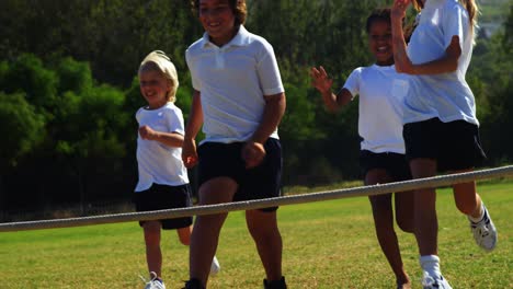 children running in park during race