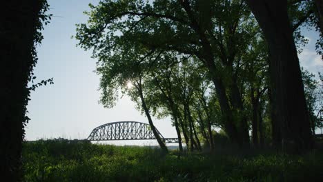 scenic bridge kentucky with sky and trees