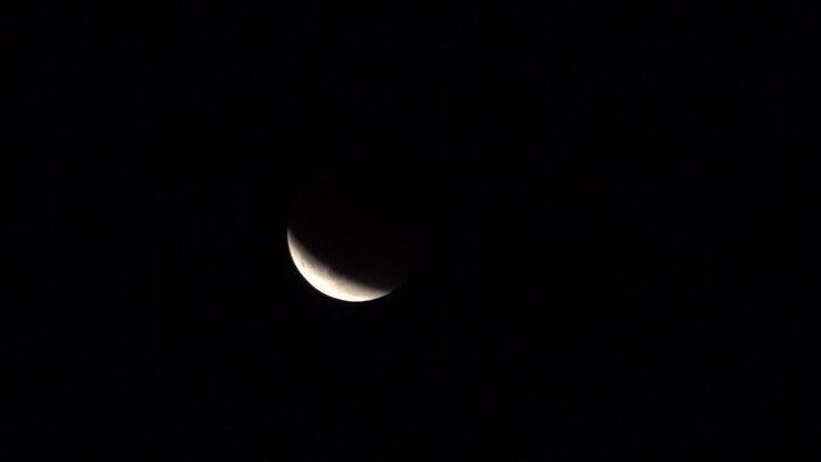 Bright Crescent Moon in a Dark Night Sky