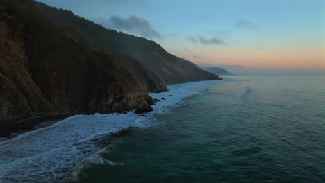 california ocean nature usal beach campground aerial drone bluffs cliffside mist clouds mountain rocky rugged remote coast vibrant sunset sinkyone wilderness waves crashing surf swell circle right