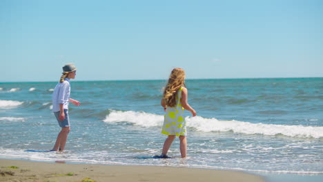 children playing at the beach