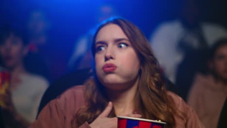 shocked girl in cinema