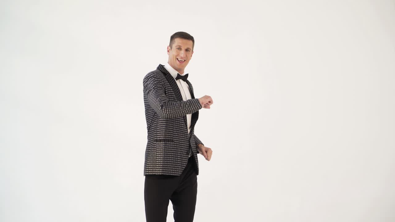 cheerful toast-master is gesticulating and posing at the celebration. Parody of the show program of leading