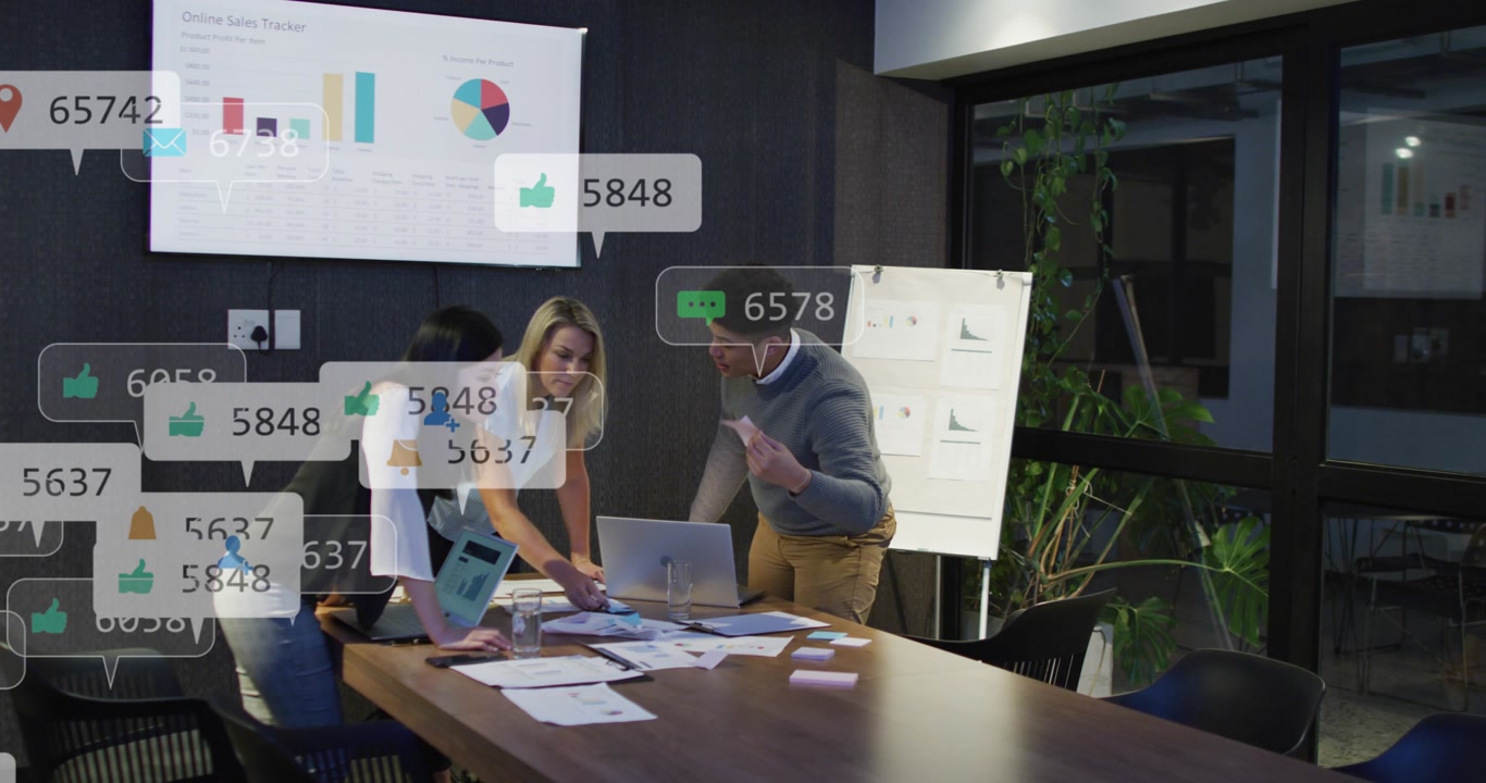 Three colleagues leaning over laptop, reacting to live metrics as overlay bubbles, refining deck
