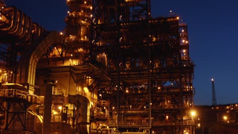 aerial view of petrochemical plant illuminated at night