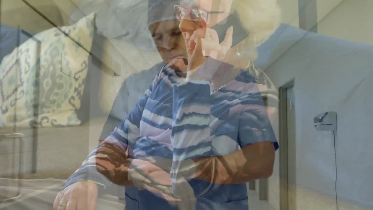 Animation of surgeon in operating room over caucasian senior women