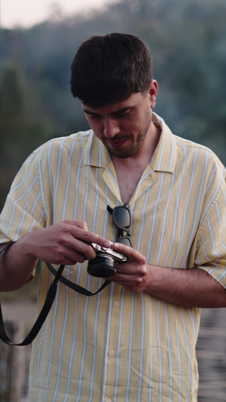 Man taking a picture with a camera