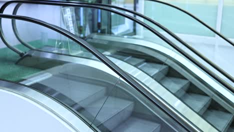 escalator operating in a bangkok shopping center