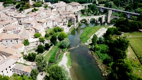 historic centre of besalu with romanesque bridge over fluvia river