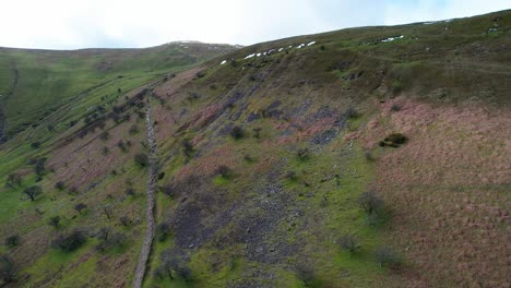 Aerial-rising-shot-of-mountains-in-Brecon-Beacons-National-Park,-Wales